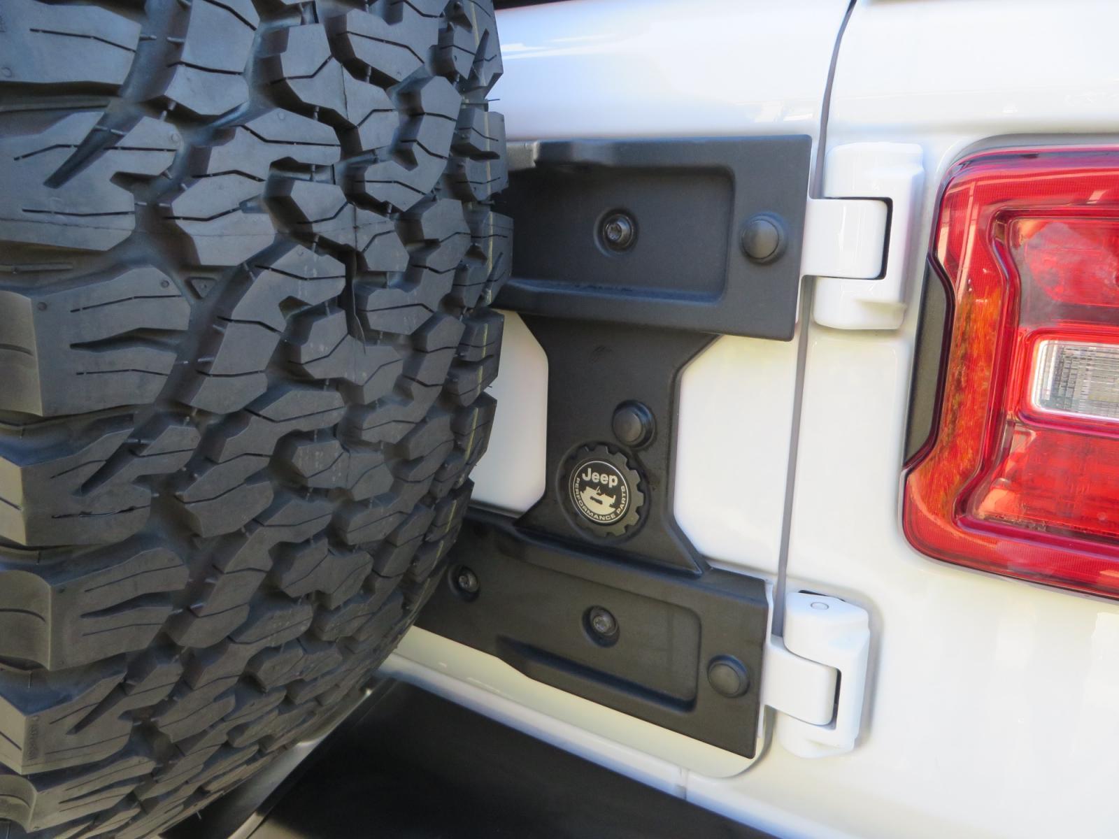 2020 White /TAN Jeep Wrangler Unlimited Rubicon (1C4HJXFG8LW) with an 3.6L V6 DOHC 24V FFV engine, 6A transmission, located at 2630 Grass Valley Highway, Auburn, CA, 95603, (530) 508-5100, 38.937893, -121.095482 - 3" Zone offroad suspension system, Fox adventure series shocks, rocksliders, Teraflex HD tire relocation, Mopar HD tailgate hinge, 17" KMC wheels, and 37" BFG KO2 tires. - Photo #13